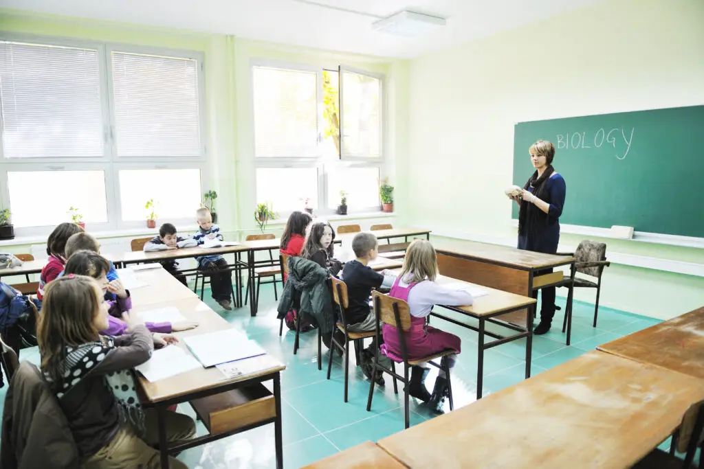 doctor teaching kids at school